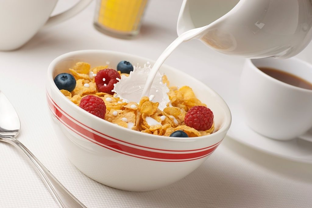 Bowl Of Cornflakes With Milk And Berries. Good Morning!