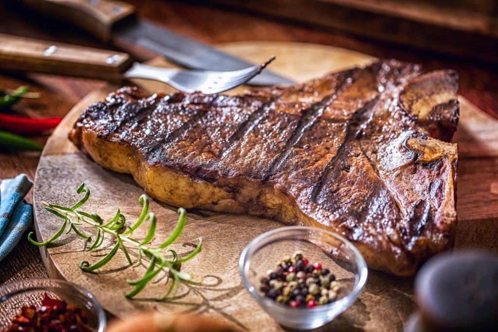 T Bone Steak Freshly Roasted On Barbecue Grill